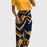 "Cassandra Set s Majicom i Hlačama" could be rewritten as "Cassandra Komplet s Majicom i Hlačama".