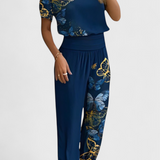 "Cassandra Set s Majicom i Hlačama" could be rewritten as "Cassandra Komplet s Majicom i Hlačama".